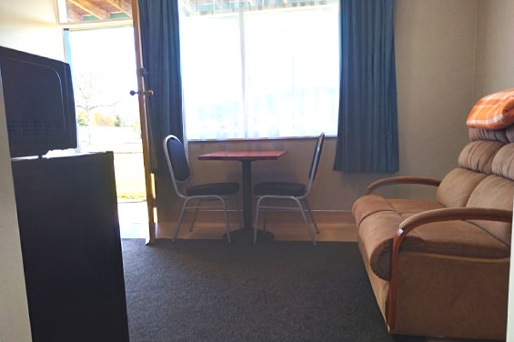 Compact Motel Unit - sofa and dining table
